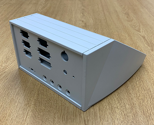 UNIDESK enclosure with CNC machined rear extrusion.