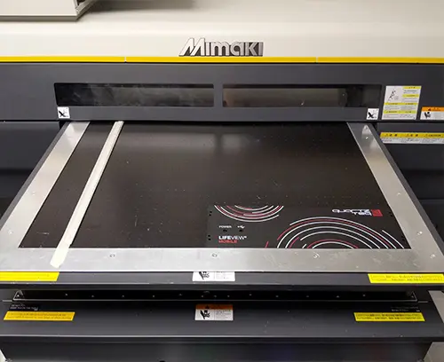 In-house A2 flatbed digital printer